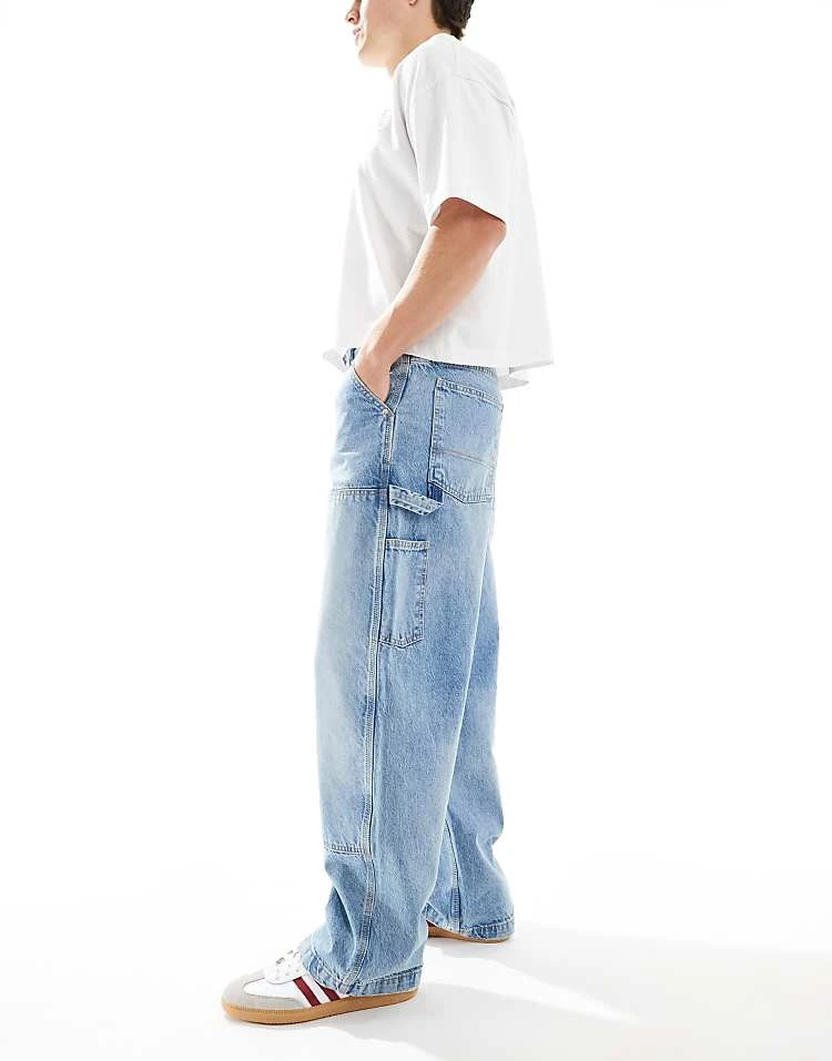 Pull&Bear Baggy Front Pocket Detail Jeans In Washed Blue For Men 5 Pull&Bear Baggy Front Pocket Detail Jeans In Washed Blue For Men - Image 3