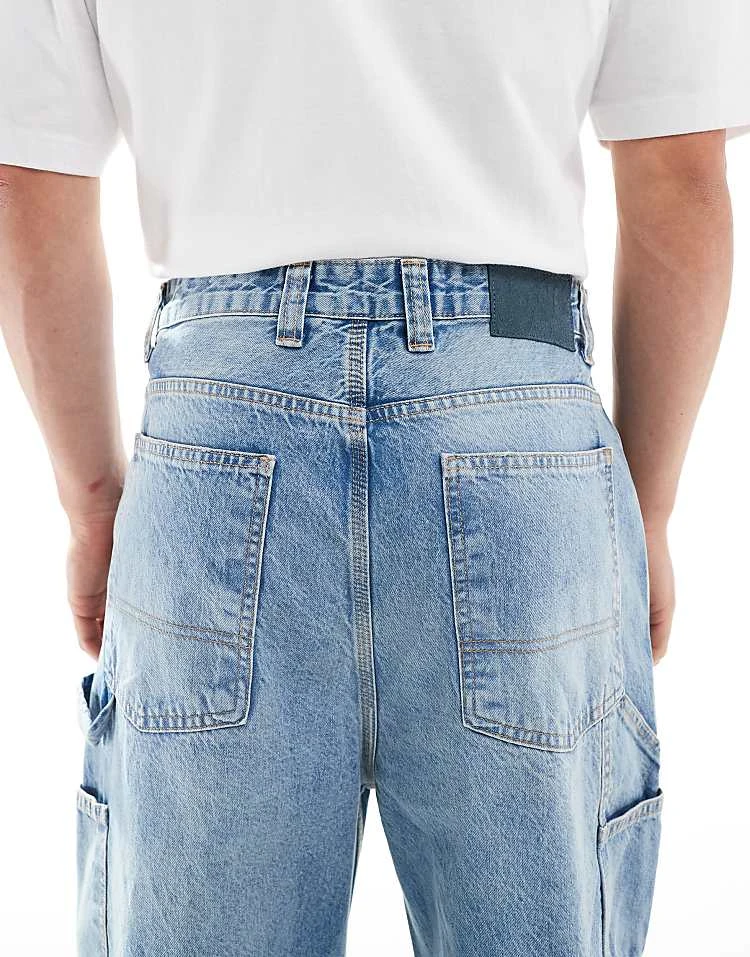 Pull&Bear Baggy Front Pocket Detail Jeans In Washed Blue For Men 6 Pull&Bear Baggy Front Pocket Detail Jeans In Washed Blue For Men - Image 4